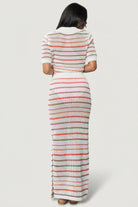 Back view of Viento Skirt in multi stripe illustrating elastic waistband, relaxed pencil silhouette and clean finish.