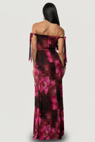 Side view of Allegra off-shoulder dress highlighting the tulip-style skirt, hidden zipper, and fully lined construction.