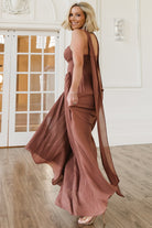 Close-up of pleated bodice and sweetheart neckline with silicone grip, showing fabric texture and pleat detailing in rosy brown.