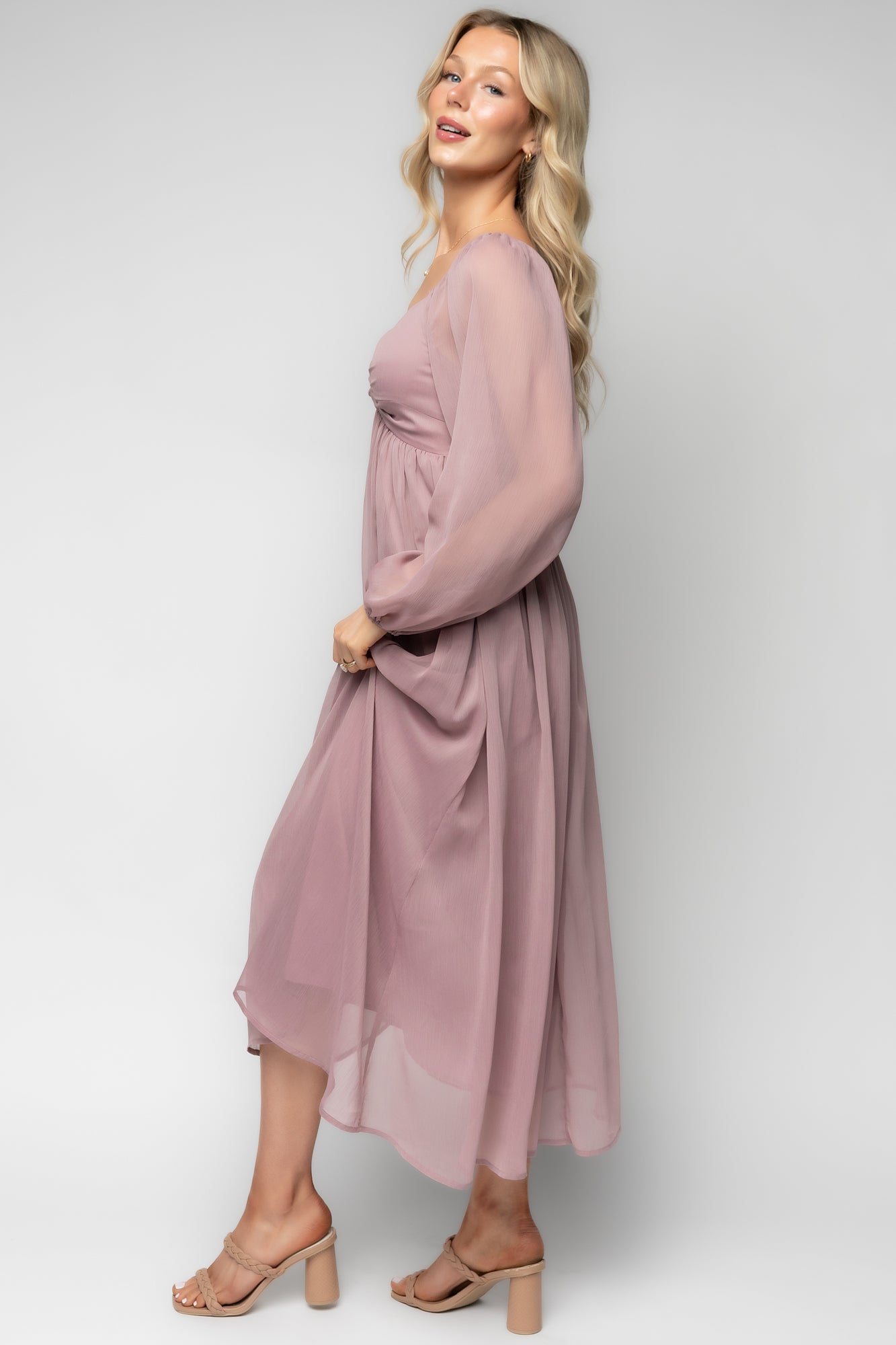 Detail shot of puffed sleeve and elastic shoulder on the Dione Midi Dress in dusty lilac, showing the unlined sleeve and soft georgette fabric.