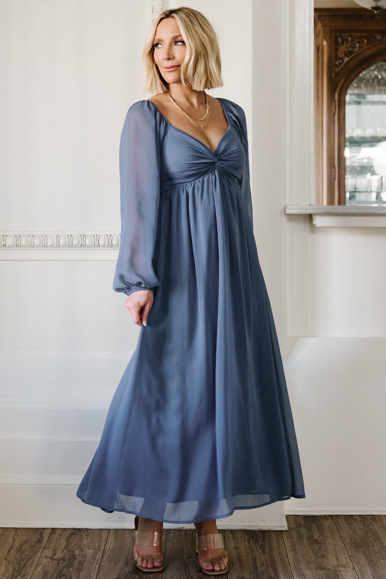Close-up of knotted bust and horizontal seaming on the Dione dress, highlighting fabric texture and sweetheart neckline.