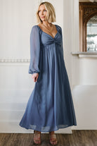 Close-up of knotted bust and horizontal seaming on the Dione dress, highlighting fabric texture and sweetheart neckline.