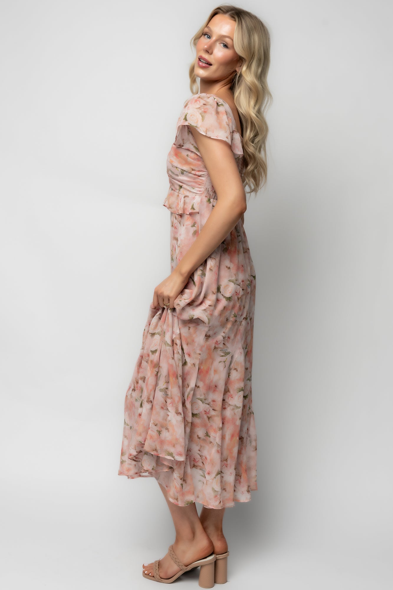 Flat-lay image of Teuila Midi Dress showing layered chiffon, fully lined body (excluding sleeves), and inverted ruffle V-waist for event styling.