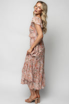 Flat-lay image of Teuila Midi Dress showing layered chiffon, fully lined body (excluding sleeves), and inverted ruffle V-waist for event styling.