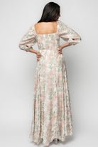Three-quarter sleeve detail of the Esther Maxi Dress showing elastic sleeve cuff and the unlined sleeve contrast against the fully lined body.