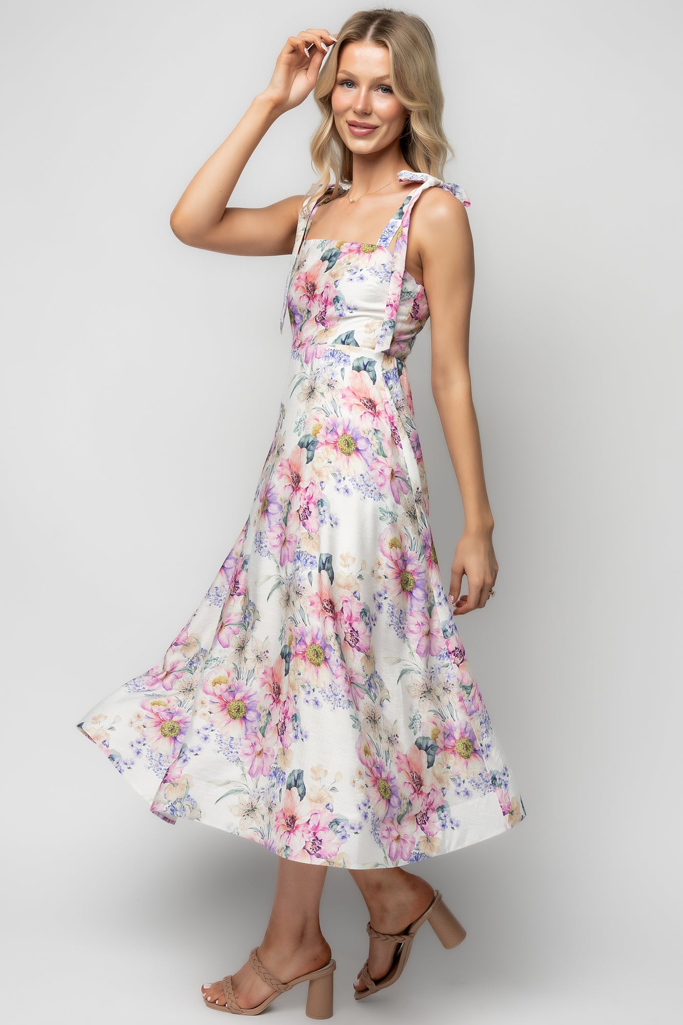 Studio shot of Opaline Midi Dress flat-lay showing square neckline, partial lining, and composition label details.