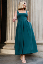 Close-up detail of the Giavanna fabric in dark green, illustrating the thick jersey-like knit, subtle texture and stretch for a comfortable fit.
