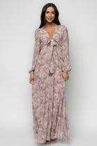 Three-quarter view: Ensley Maxi Dress in Dusty Rose Floral showing gathered shoulder detail and long elastic cuffs.