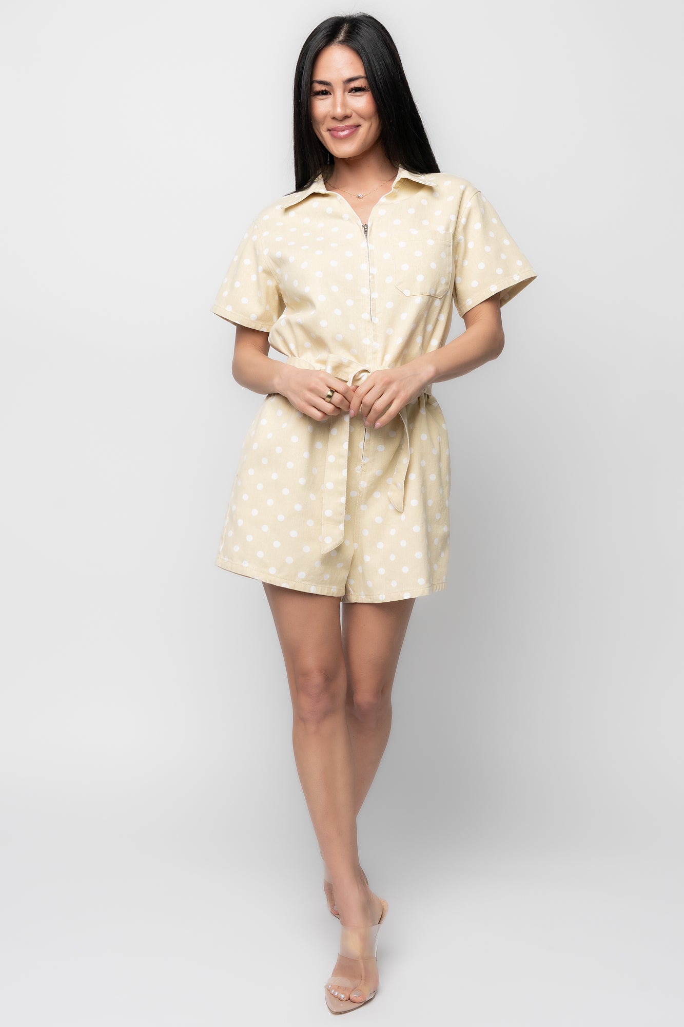 Back view of the Korra romper showing back pockets, hemline, and how the elastic waist shapes the silhouette.