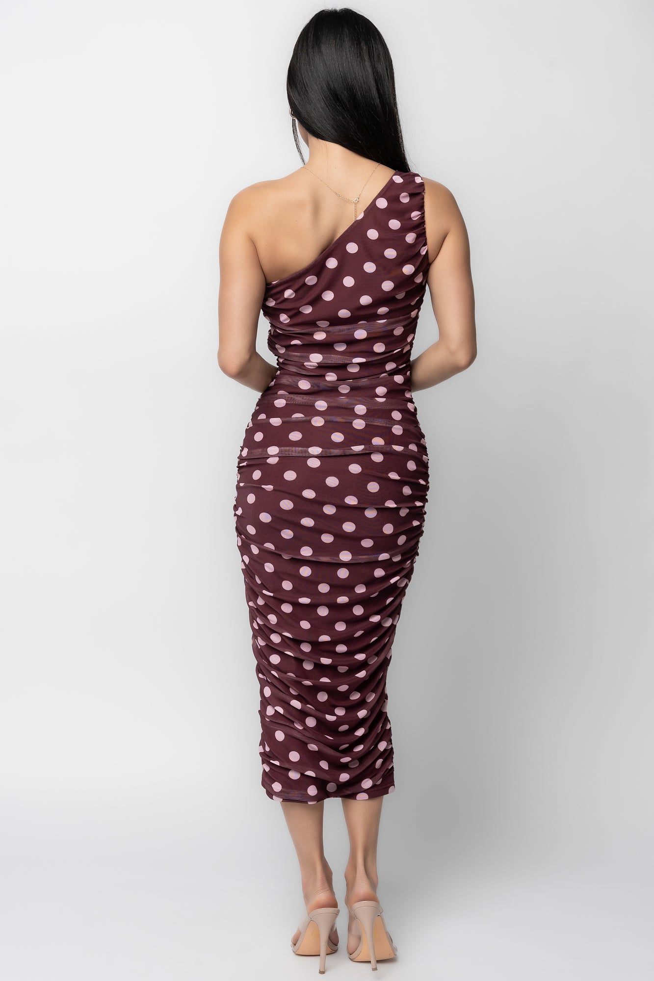 Back view of the one-shoulder midi dress showing the asymmetric neckline, fitted back and clean hemline.