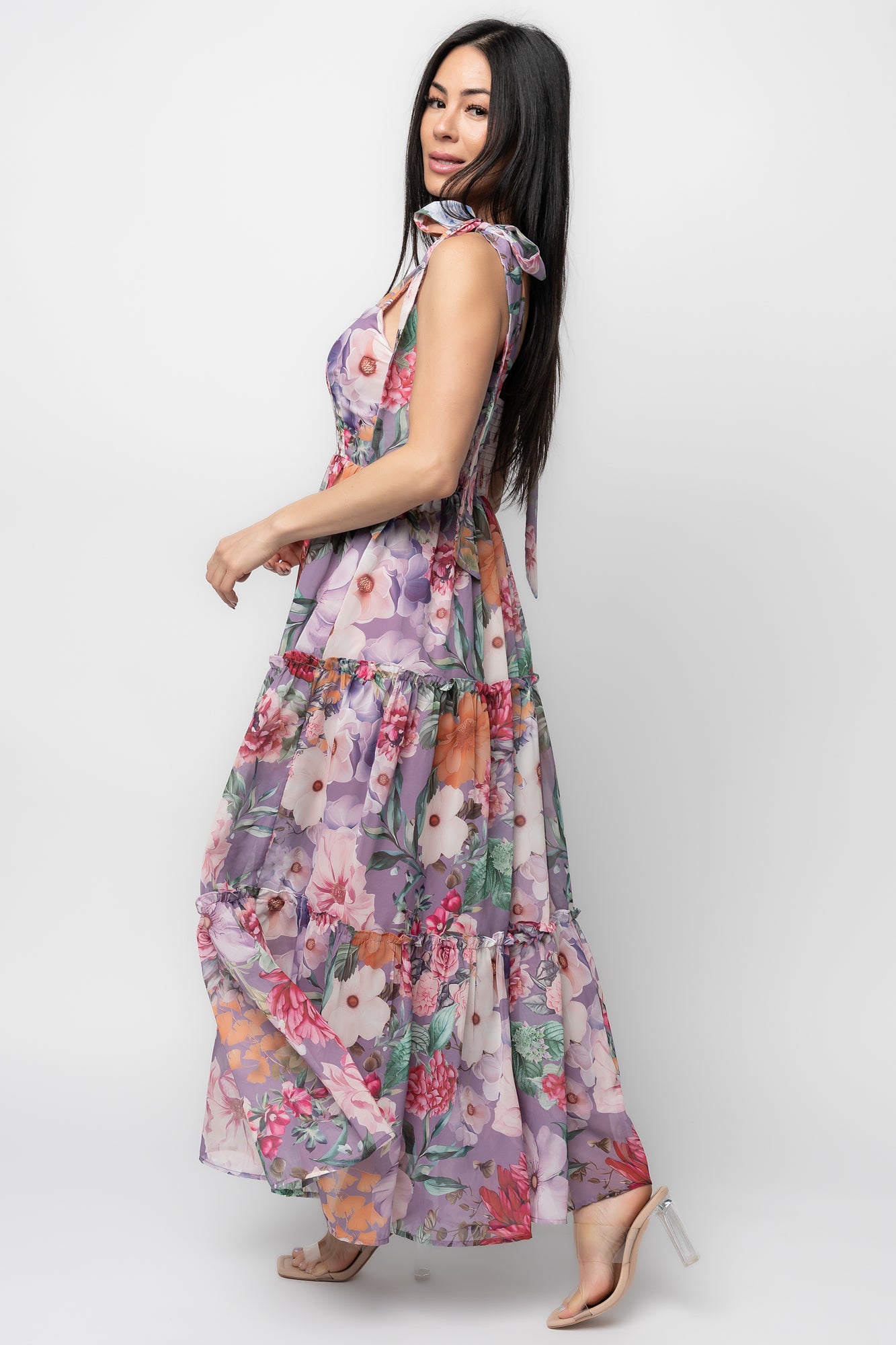 Close-up of paneled front bodice and adjustable self-tie straps on the Anita Maxi Dress, highlighting floral print, smocking and chiffon texture.