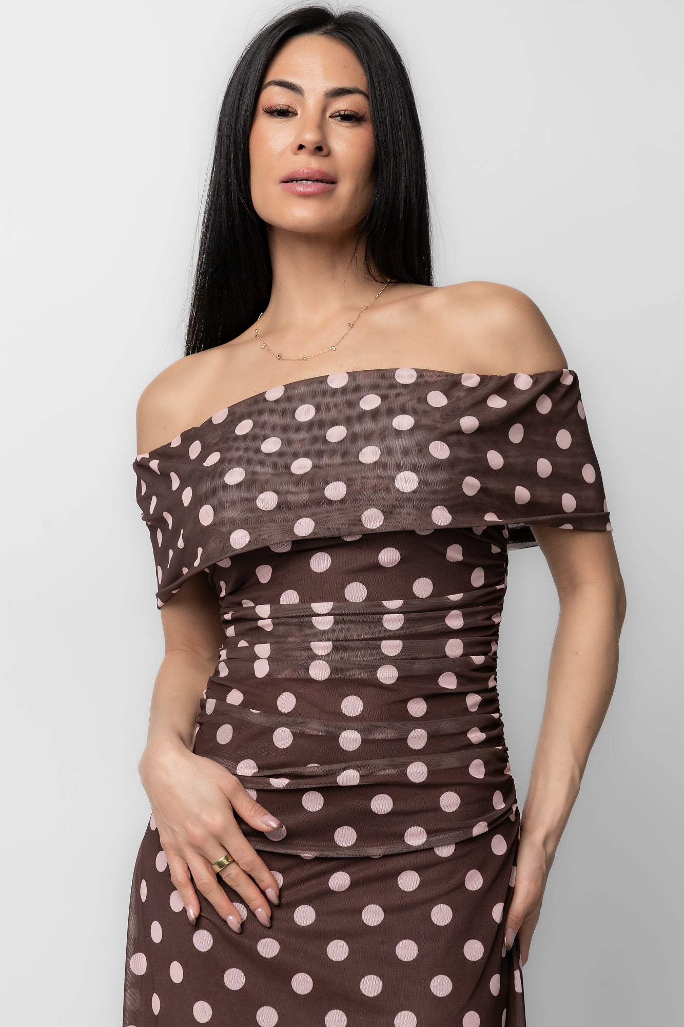 Back view of Maisie maxi dress showing discreet back zipper, fitted waist and full lined skirt in chocolate with blush polka dots.