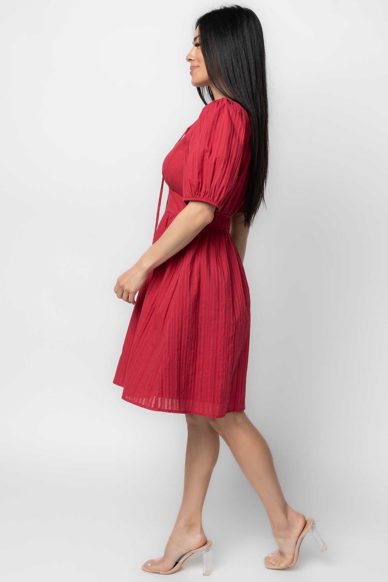Close-up of Hayley Short Dress bust detail in dusty red, showing functional tie at the bust and V-neckline finish.