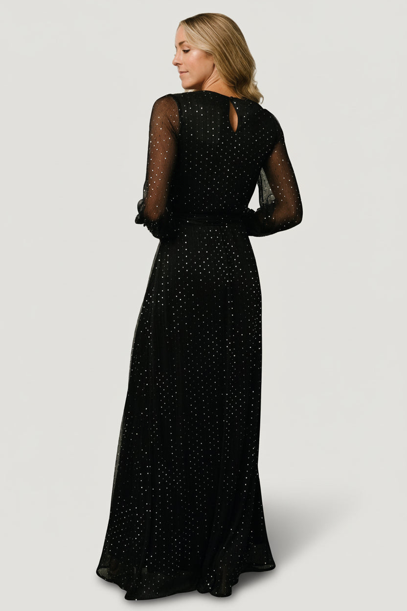 Styled image of Abigail Sparkle Gown (Twilight) on model with subtle movement showing full skirt and placement of sequins across fabric.