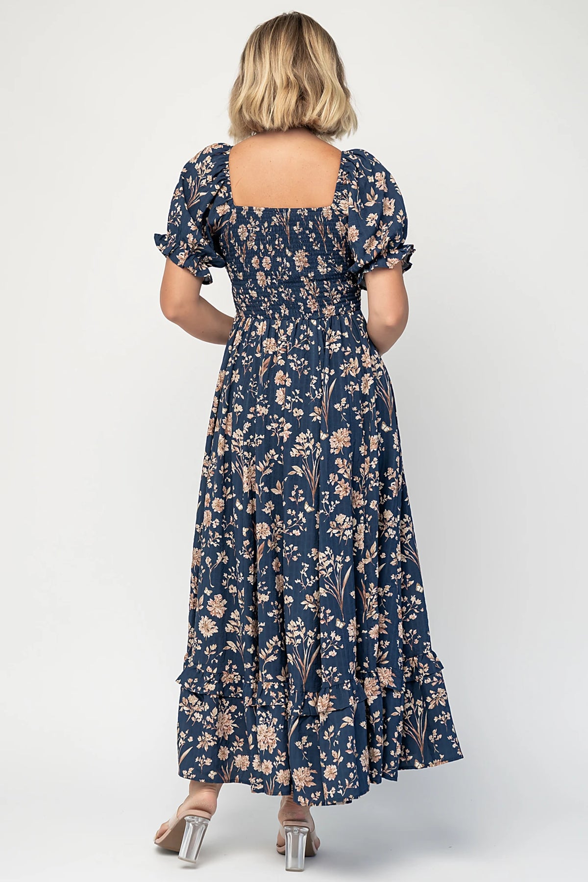 Addison Maxi Dress in Dark Blue Floral with square neckline, oversized sleeves, smocked back, and tiered ruffle skirt.
