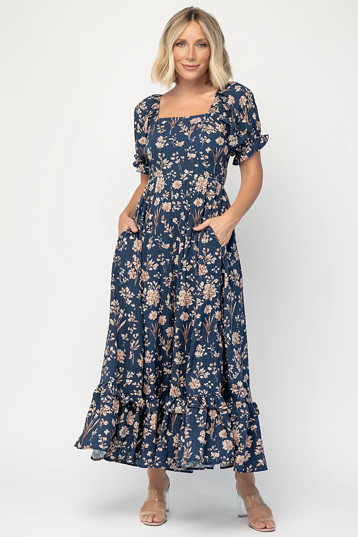 Addison Maxi Dress in Dark Blue Floral with square neckline, oversized sleeves, smocked back, and tiered ruffle skirt.