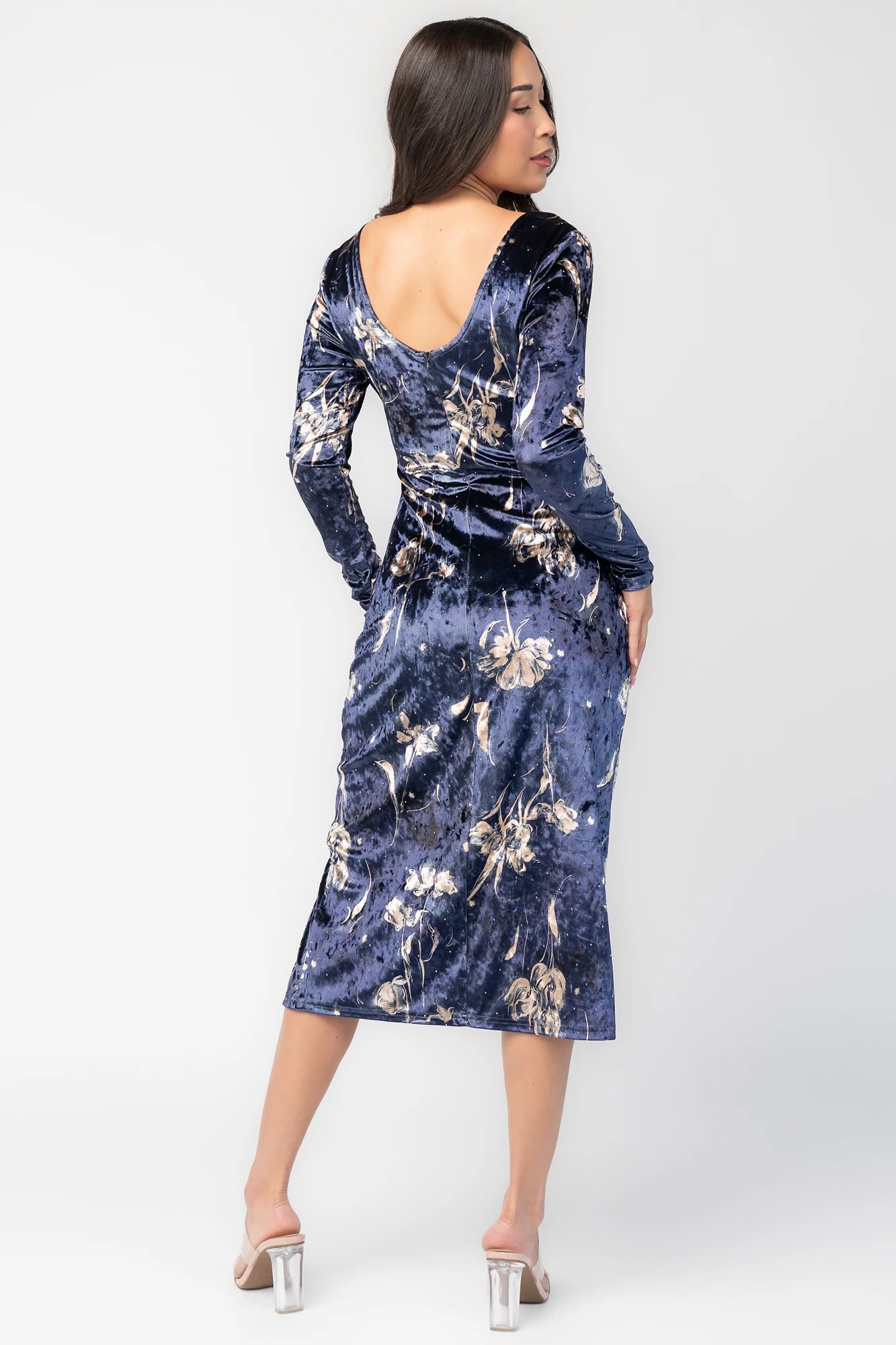 Afterglow Velvet Midi Dress in Navy + Gold with metallic florals, boat neckline, long sleeves, and side draping.