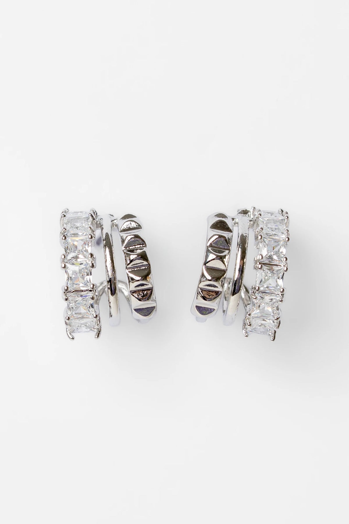 Ali Stacked Huggie Hoops in Silver with stacked design and cubic zirconia accents.