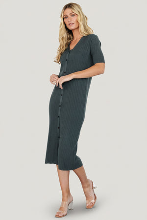 Front view of Alicia wide-ribbed V-neck midi dress in dusty jade on model, showing short sleeves, mid-calf hem, and gentle drape of the fabric.