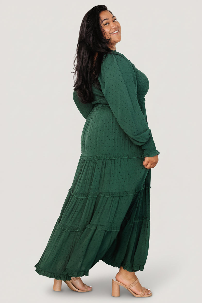 Styled outfit image of the evergreen smocked dotted maxi dress with accessories, showing square neckline and versatile styling options.