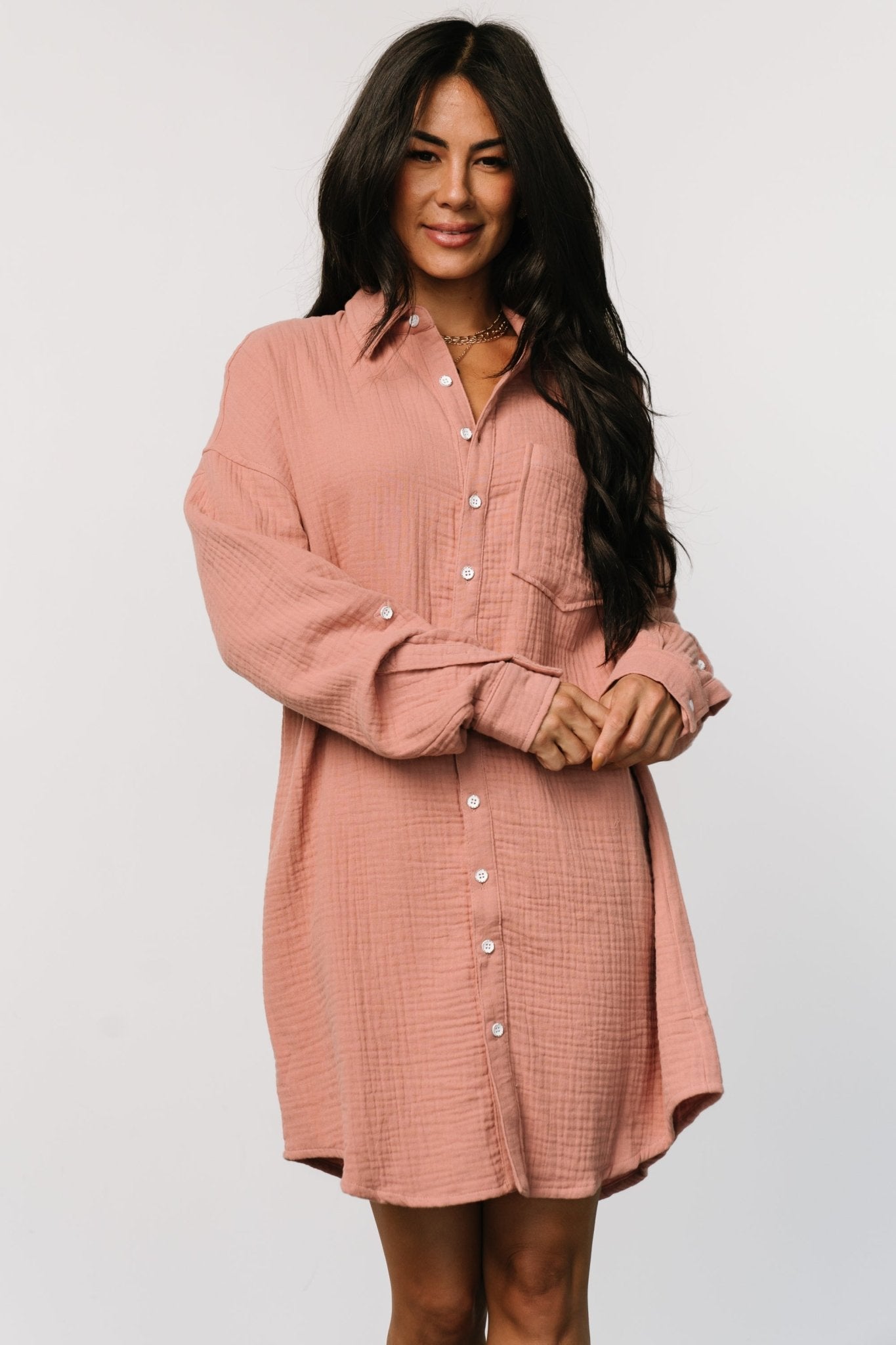 Styled look of the dress paired with casual footwear, illustrating everyday styling options and the muted dusty rose color in real-life wear.
