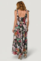 Side view of the Anita Maxi Dress showing the tiered skirt movement, adjustable straps, and fully lined interior for smooth coverage.