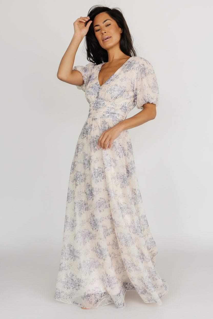 Image showing convenient side pocket on cream and blue floral maxi dress with soft mesh overlay and lining visible.