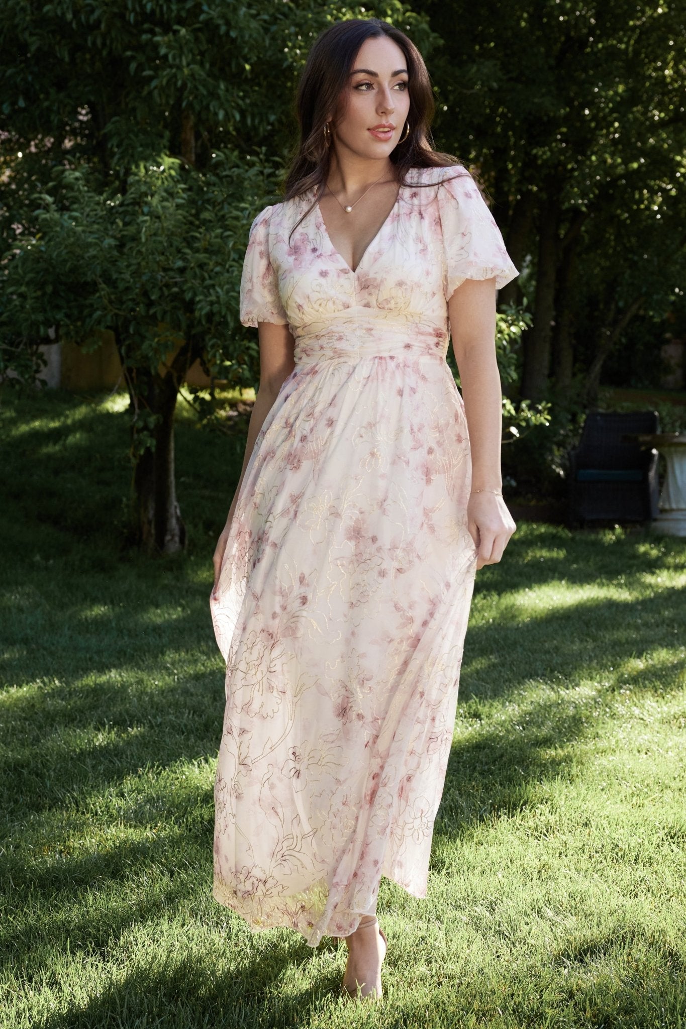 Full-length studio shot of the Ardley Maxi Dress in mauve floral showing hemline, skirt movement, and fully lined silhouette without the backdrop text.