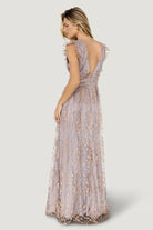 Back view of gown showing deep V back bodice, hidden zipper with hook-and-eye closure, and shimmer tulle overlay.