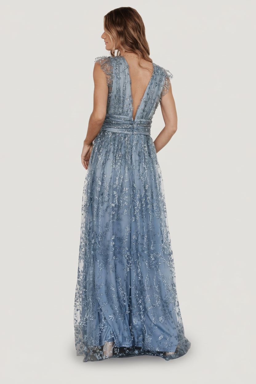 Back view of the Arlene Shimmer Gown in Winter Blue, showing the deep V back, hidden zipper and hook-and-eye closure, and full lining.