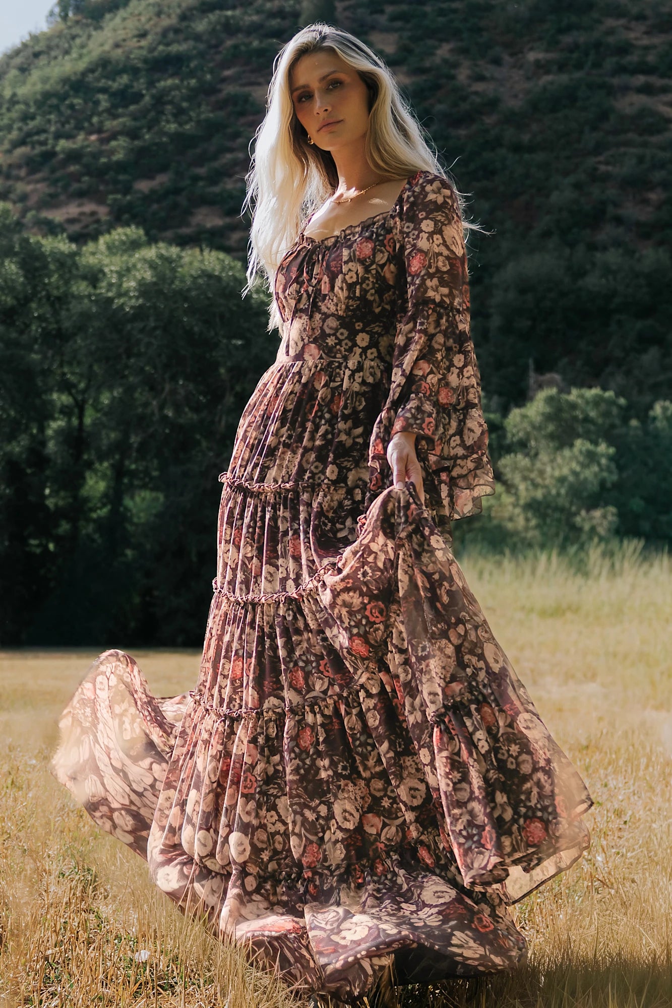 Ashwood Boho Maxi Dress in Brown Floral with square neckline, sheer flared sleeves, smocked back, and tiered skirt.