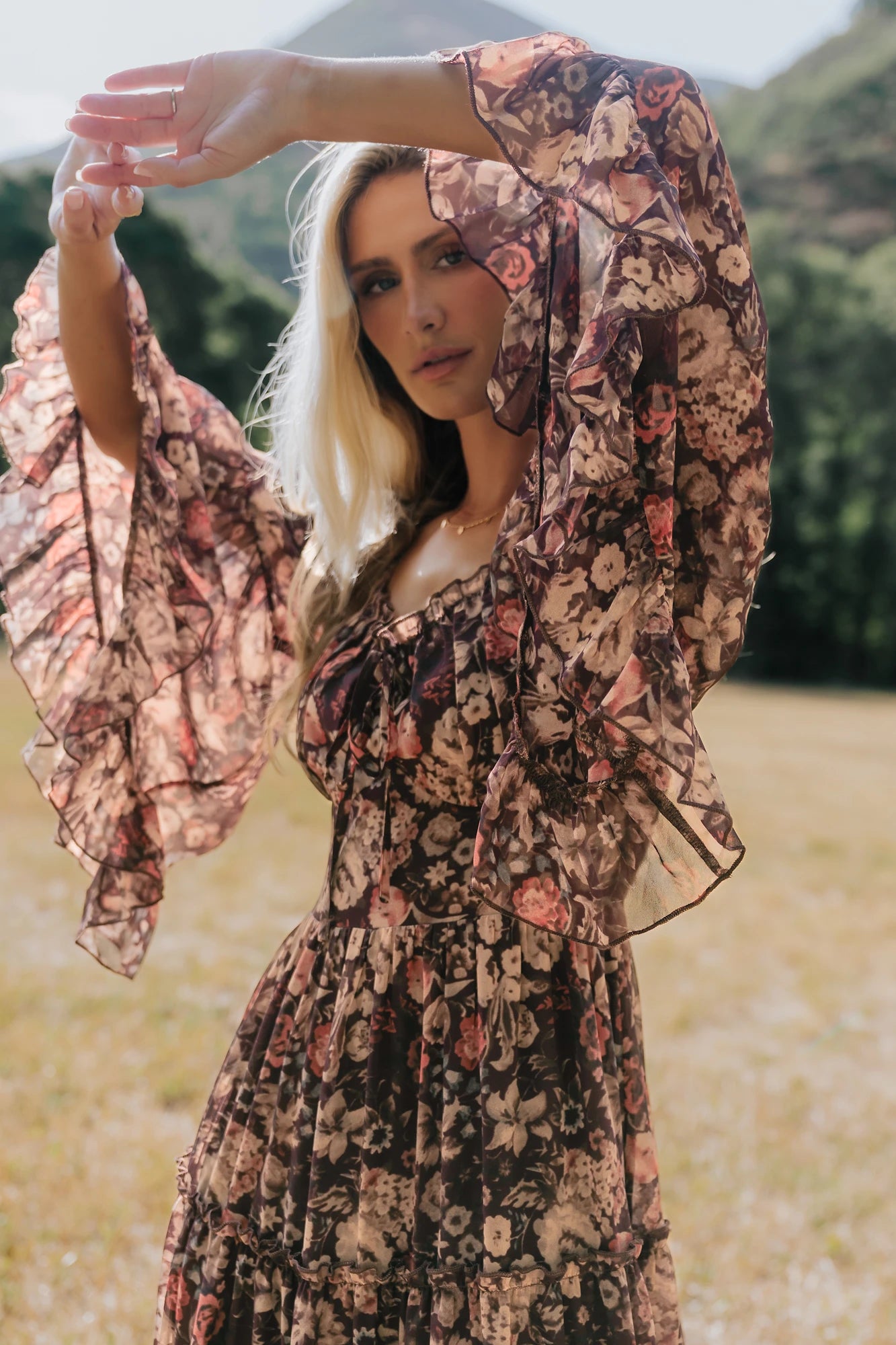 Ashwood Boho Maxi Dress in Brown Floral with square neckline, sheer flared sleeves, smocked back, and tiered skirt.