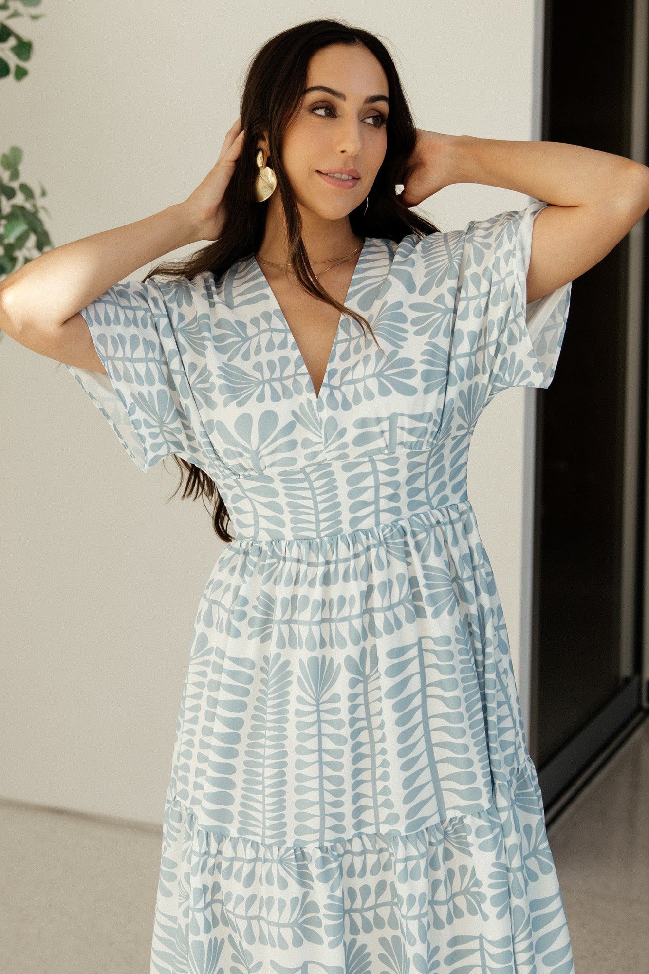 Flat-lay view of blue-print kimono dress showing overall print, sleeve shape, and midi length for easy styling reference and comparison.