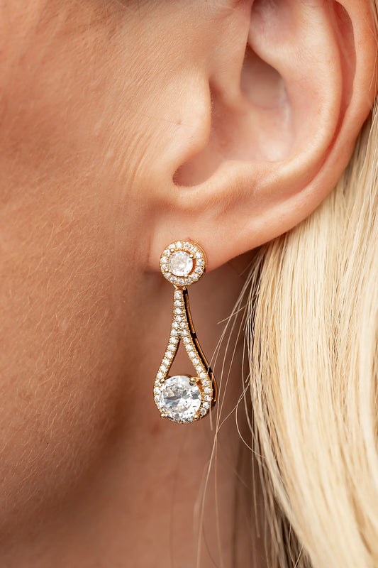 Balini Pave Drop Earrings in Gold with round clear stones, pavé detailing, and elegant teardrop drops.