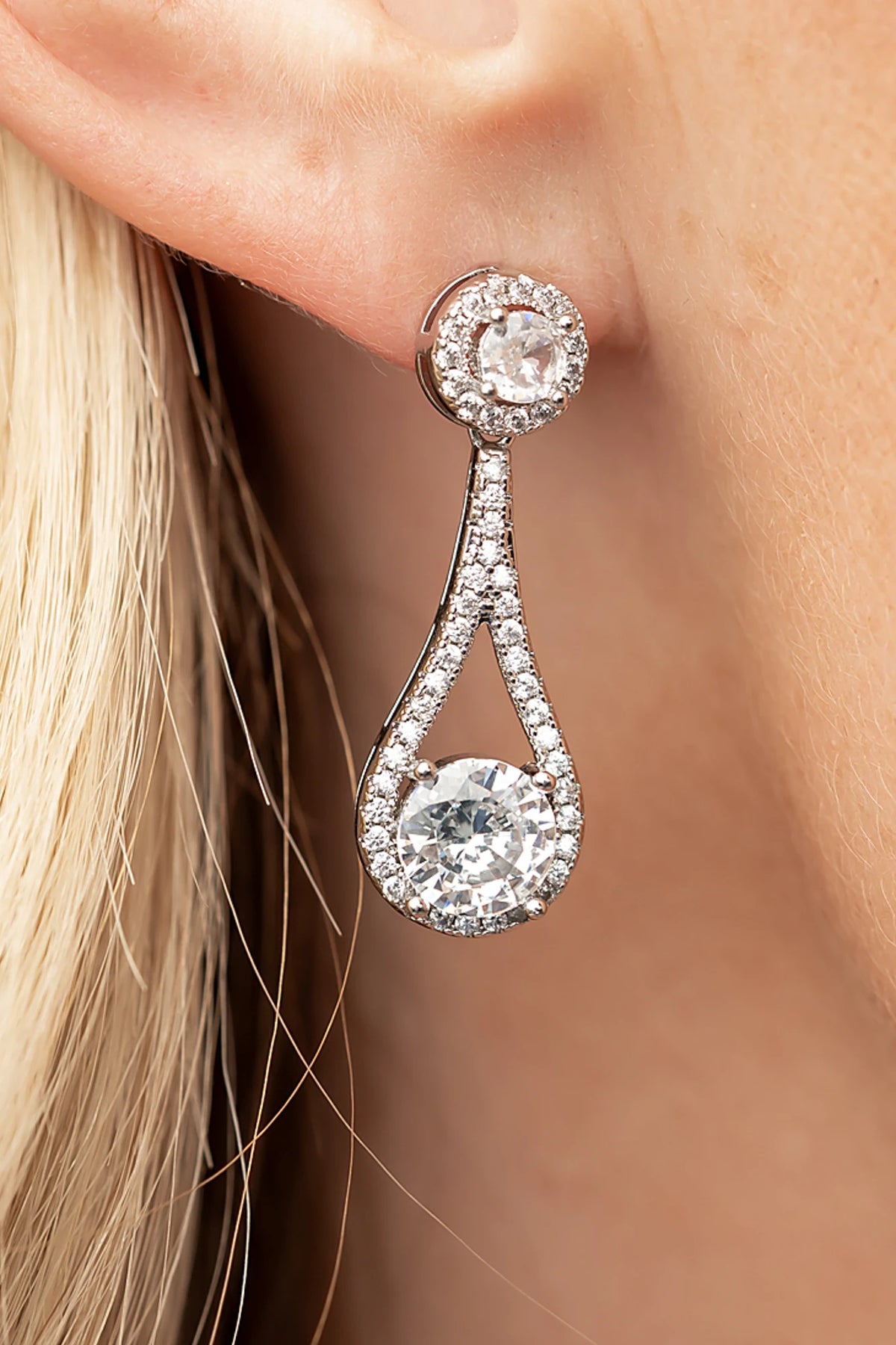 Balini Pave Drop Earrings in Silver with round clear stones, pavé detailing, and elegant teardrop drops.