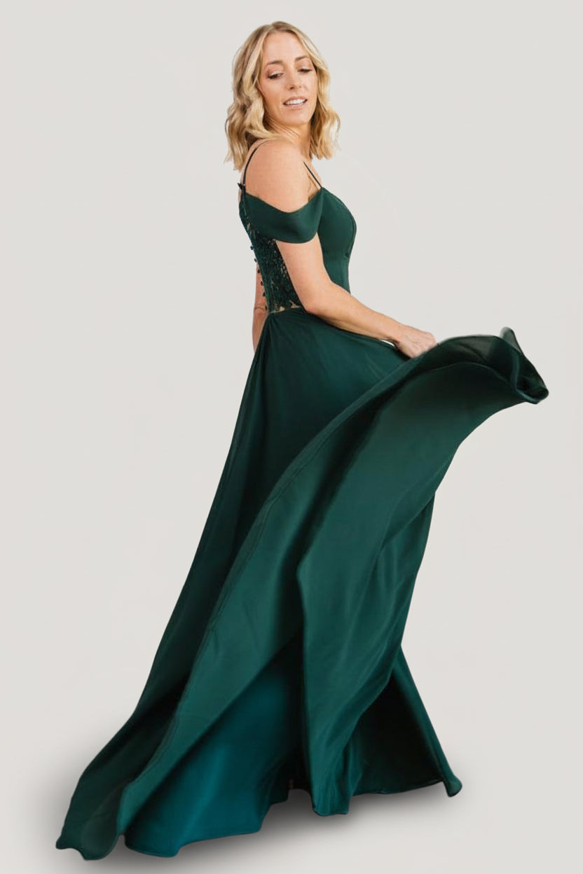 Side view showing the hidden side zipper with hook, double straps and the mid-thigh slit for an elegant silhouette.