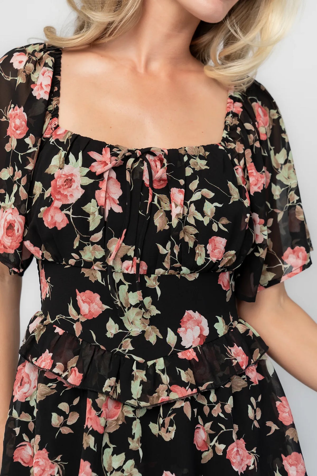 Bliss Tiered Maxi Dress in Black Multi Floral with square neckline, flutter sleeves, smocked back, and tiered maxi skirt.
