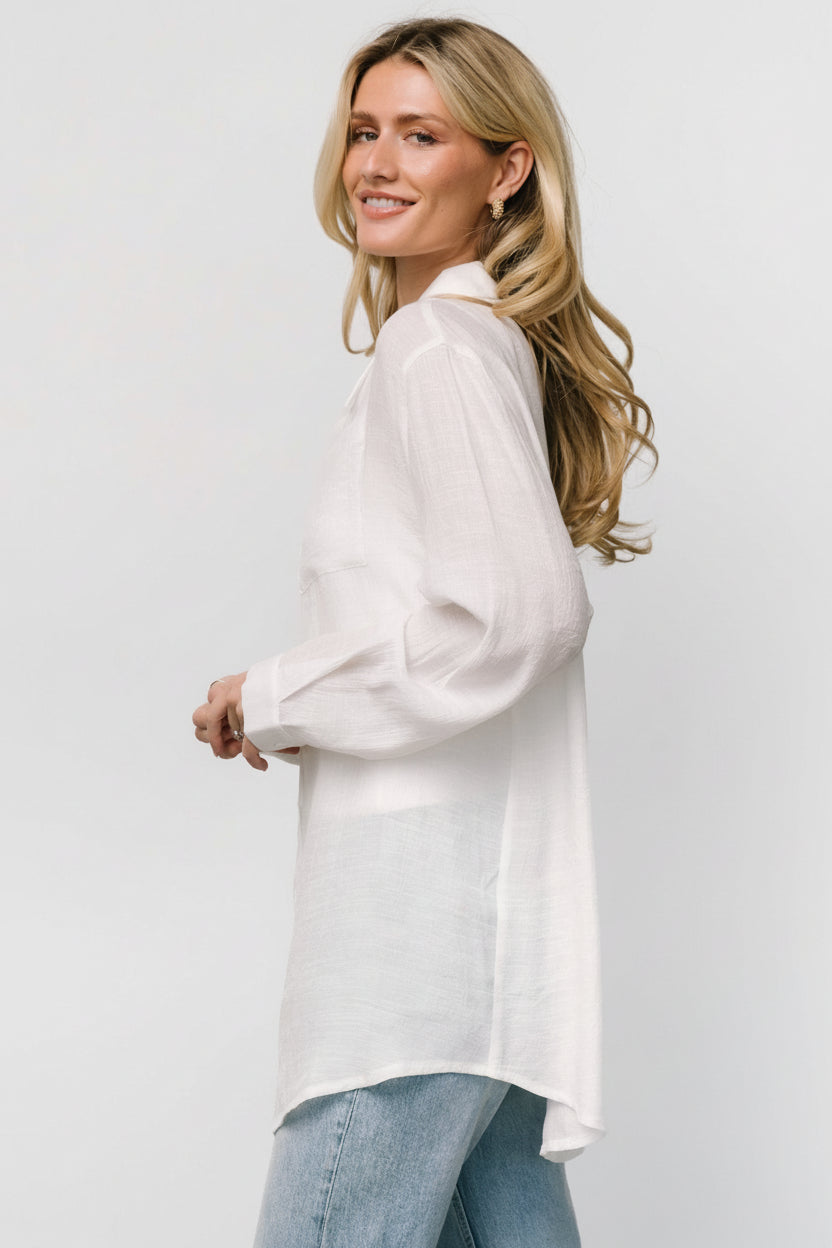 Three-quarter view of Breck Button Up Top in off white showing collar, button front, and relaxed straight hemline.