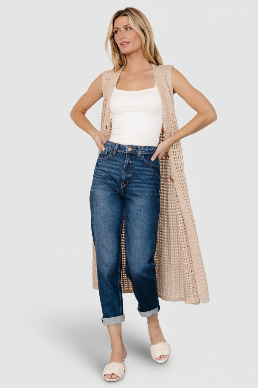 Model wearing Bretta Duster Vest in natural; styled over a tee to show fit, length, and casual layering possibilities.