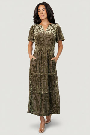 Front view of an olive burnout velvet midi dress with a notched V-neckline, flutter sleeves, smocked waist and flattering drape.