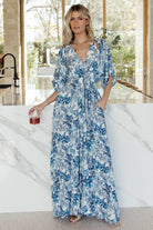 Side angle of Byron jumpsuit showing hidden side pocket and fluid wide-leg silhouette