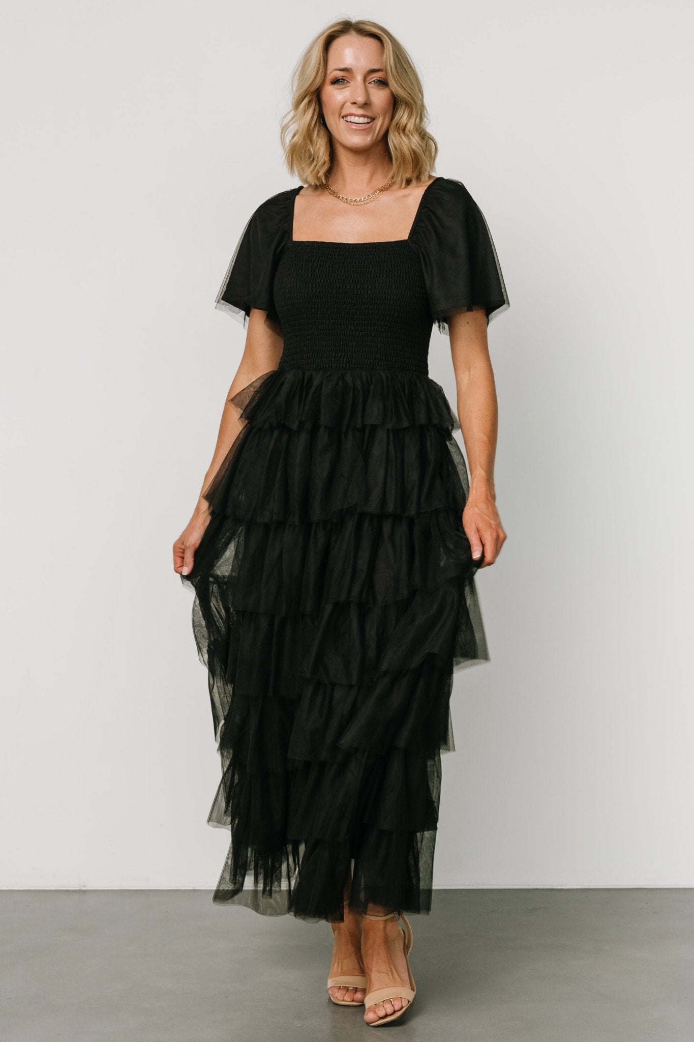 Louisa black textured tiered dress