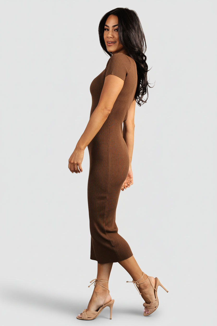 Back view of Dana ribbed midi dress in mocha brown on model, fitted waist and clean back finish, midi hem visible.