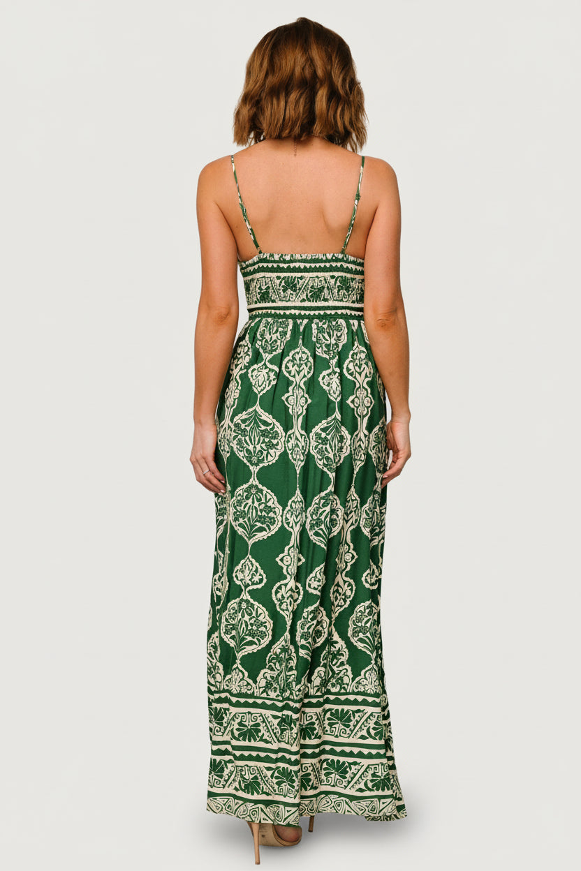 Rear view of the V-neck maxi dress focusing on the smocked back, adjustable straps and graceful drape of the maxi skirt for comfortable wear.