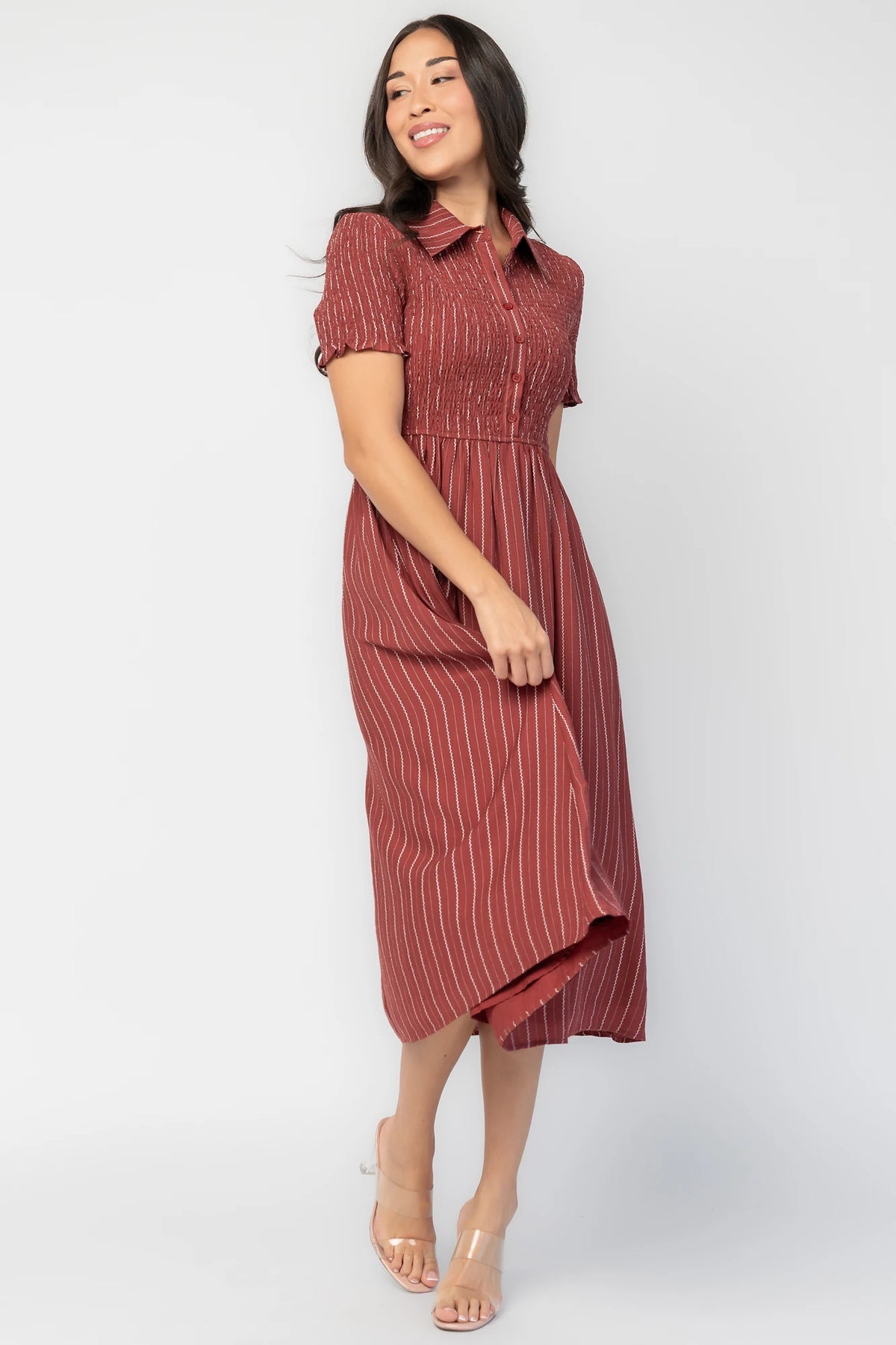 Dottie Striped Midi Dress in Light Burgundy with white vertical stripes, collared neckline, button front, and A-line skirt.