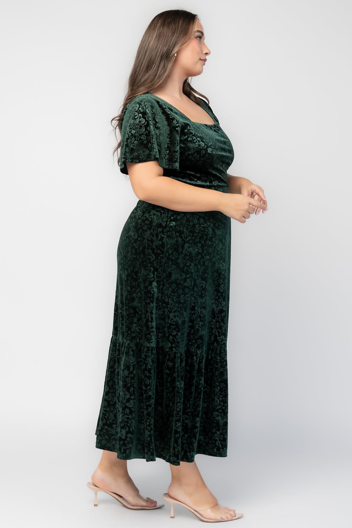 Eirene Burnout Velvet Maxi Dress in Emerald with floral velvet texture, square neckline, flutter sleeves, and tiered maxi skirt.