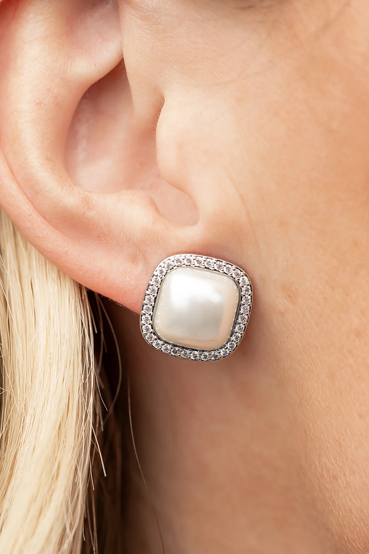 Elianna Pearl Stud Earrings in Silver with square pearl centers, clear stone borders, and polished silver-tone finish.