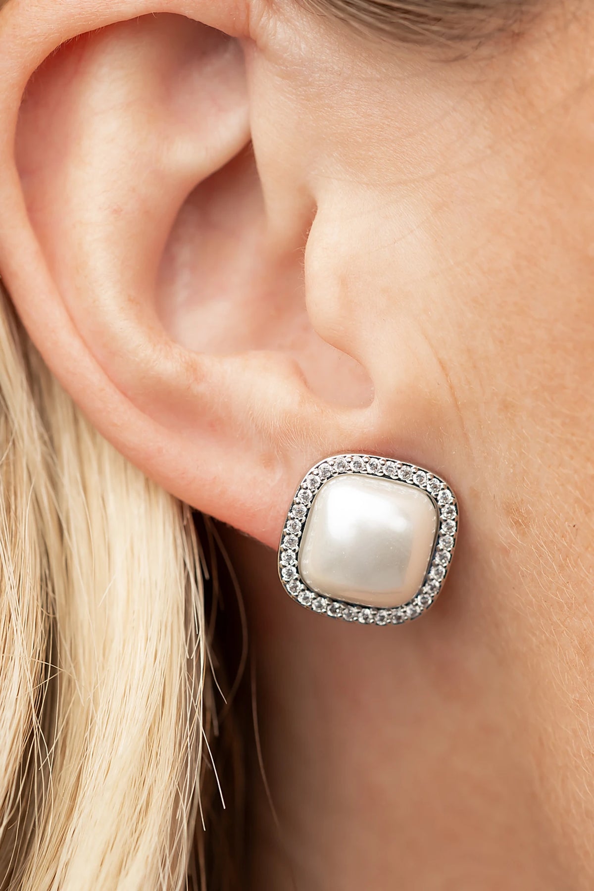 Elianna Pearl Stud Earrings in Silver with square pearl centers, clear stone borders, and polished silver-tone finish.
