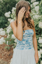 Model wearing the Eloise Link Bracelet on the wrist, showcasing elongated links and natural drape for everyday styling inspiration.