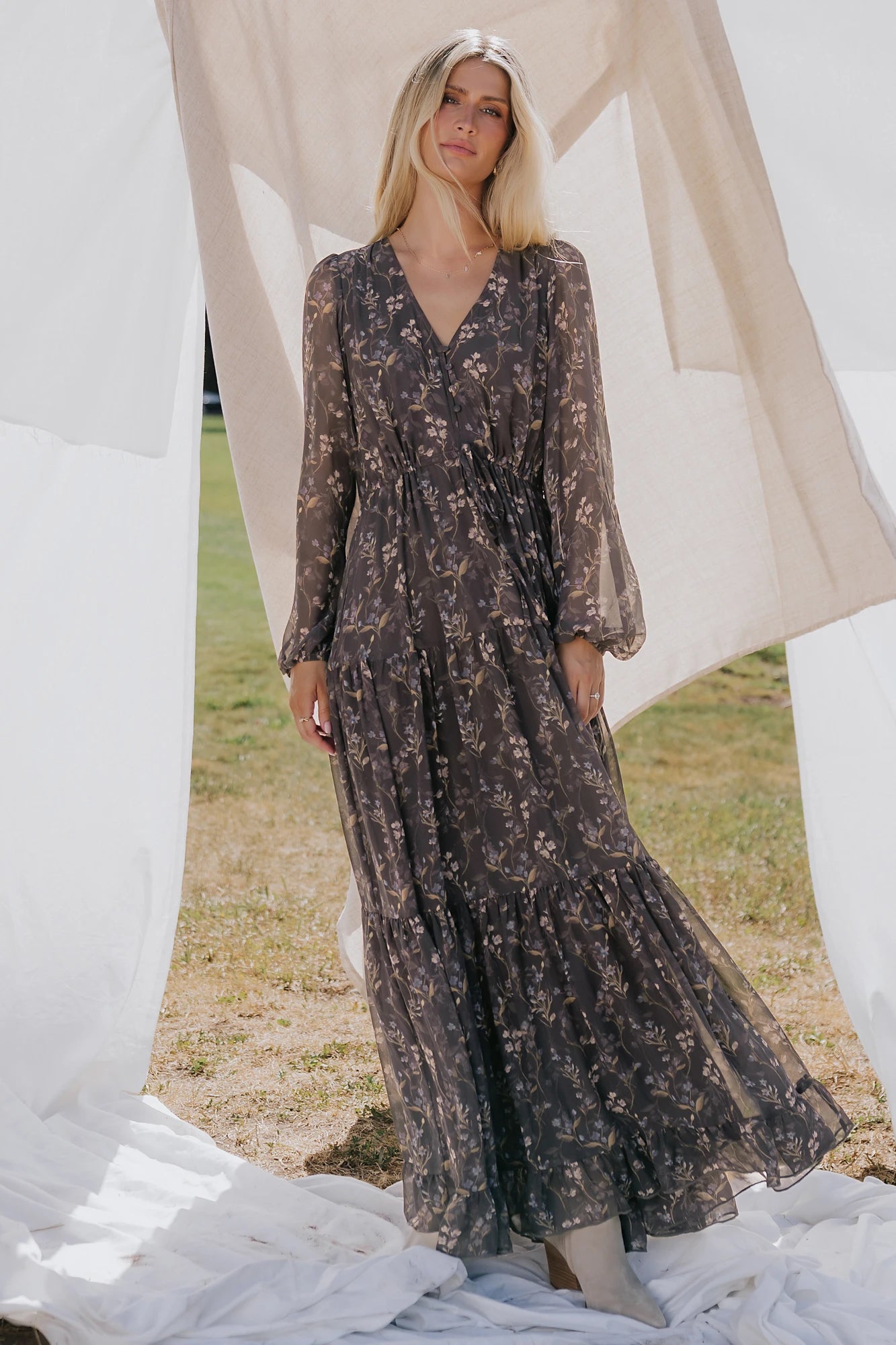 Hazel Boho Maxi Dress in Dusk Floral with V-neck, sheer long sleeves, drawstring waist, and tiered skirt.